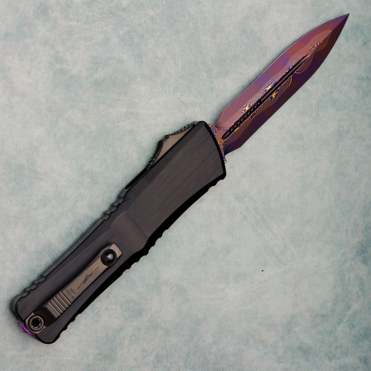 Microtech Marfione Select Combat Troodon LT Gen III D/E Hefted Alloy Blued Baker Forge Coppermai Damascus Purple Haze Accent 1142-16MS3