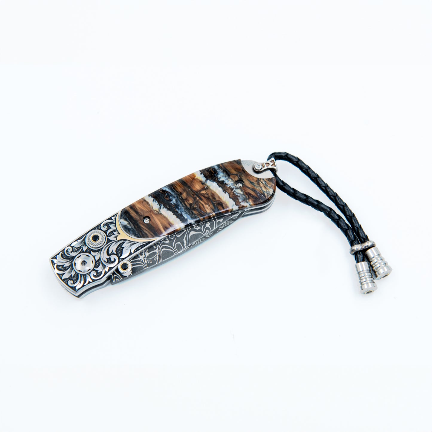 WILLIAM HENR Y The Kestrel ' features beautiful hand-engraved handles with 24K gold inlays