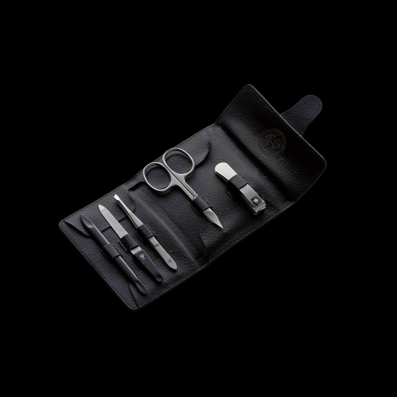 Boker Arbolito Classic manicure set with five stainless steel grooming tools in a premium genuine leather case