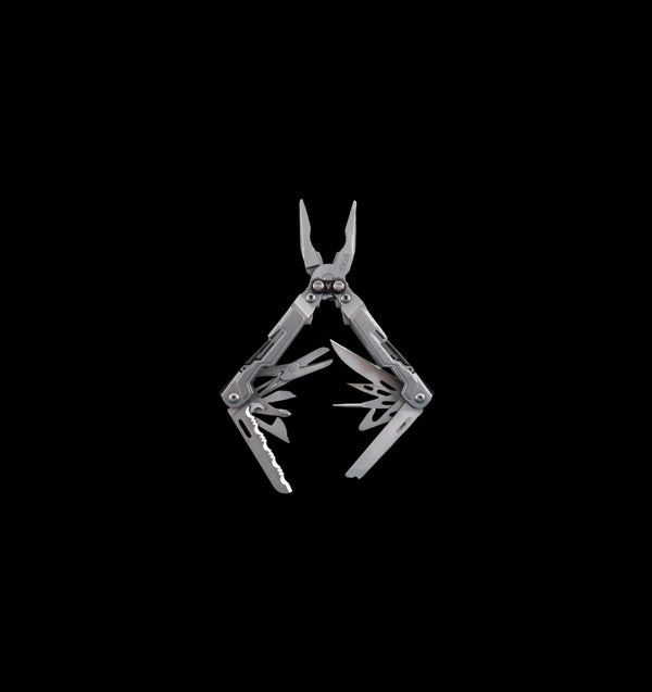 A silver multi-tool pliers with several tools extended, centered on a solid black background.