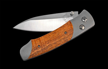 A200-13  Titanium pocketknife with stainless blade and curly koa wood
