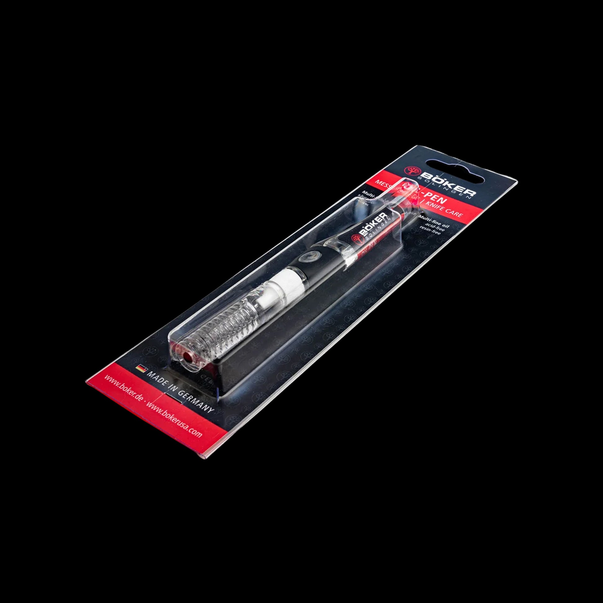 A black and silver electronic device in clear retail blister packaging with red and black backing card, photographed on a solid black background. The brand name 'ROKER' is visible on the product and packaging.