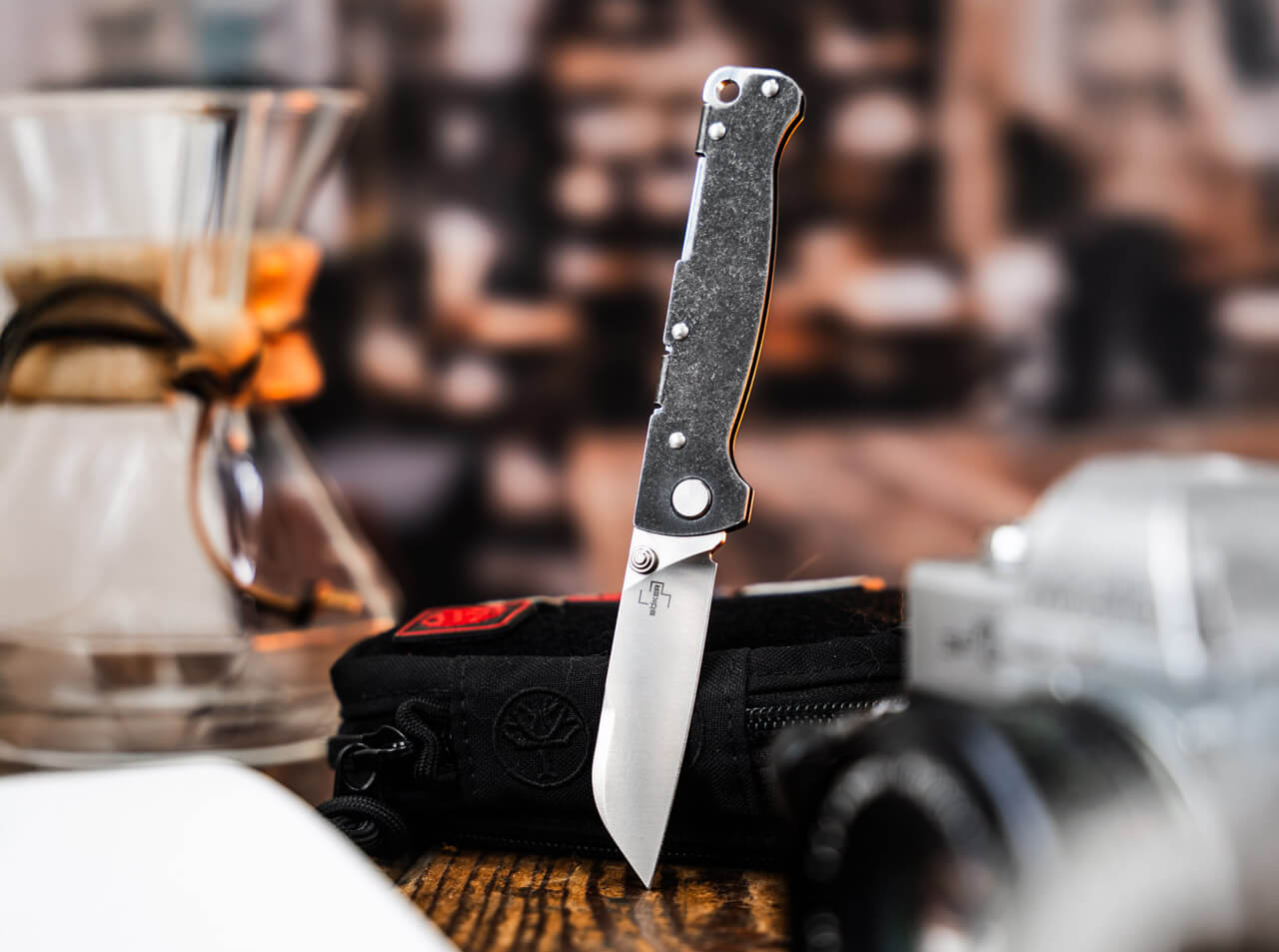 Boker Plus Atlas Sheepsfoot TS folding knife with satin D2 sheepsfoot blade, black stainless steel handle, thumb stud opening, and Backlock