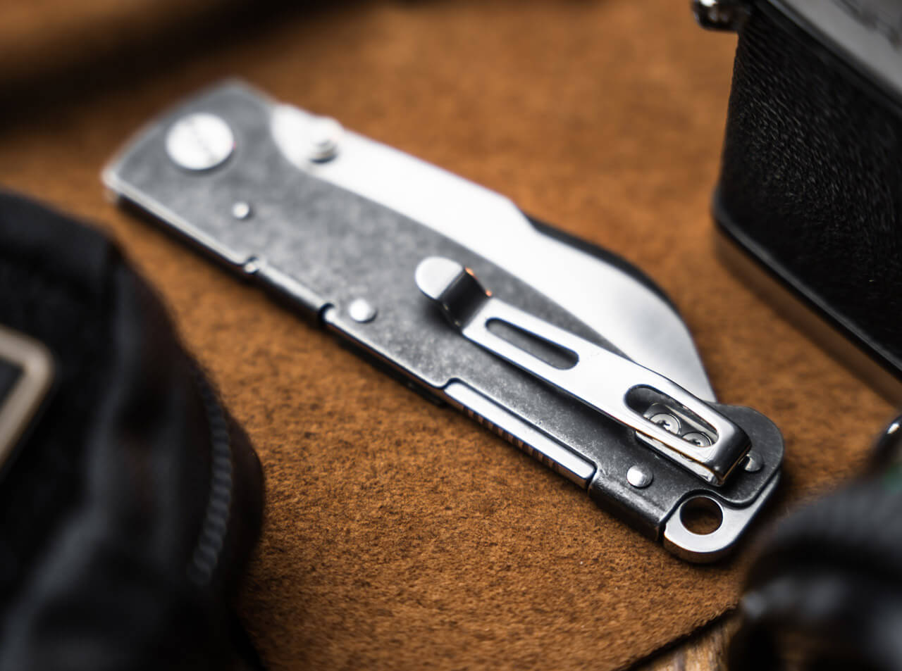 Boker Plus Atlas Sheepsfoot TS folding knife with satin D2 sheepsfoot blade, black stainless steel handle, thumb stud opening, and Backlock