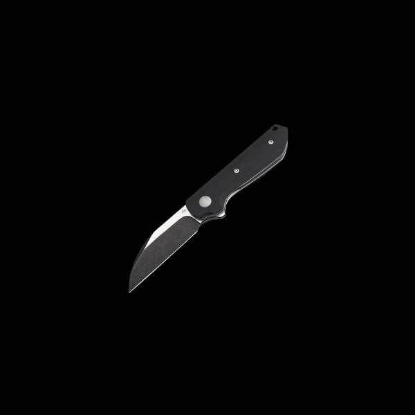 Boker Plus Corvus folding knife with black-coated Nitro-V stainless steel blade, black Micarta handle, flipper opening, and Liner Lock