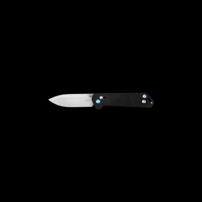 A black and tan fishing rod with blue accents, shown horizontally against a solid black background.