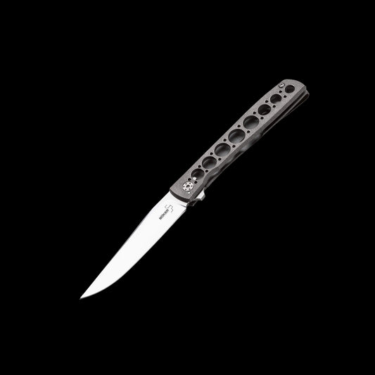Boker Plus Urban Trapper folding knife with VG-10 stainless steel blade, titanium handle, flipper opening, and titanium Framelock