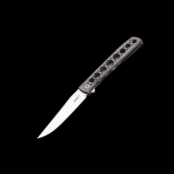 Boker Plus Urban Trapper folding knife with VG-10 stainless steel blade, titanium handle, flipper opening, and titanium Framelock