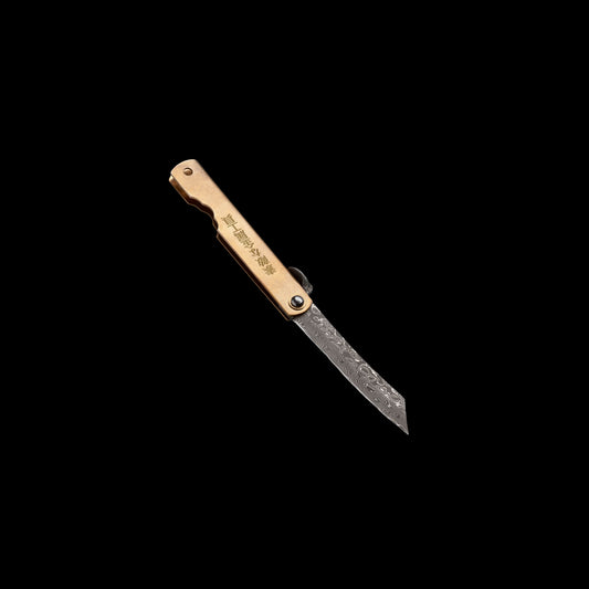 Higo Hoseki Damascus pocket knife with Damascus steel blade, brass handle, and traditional friction folder opening