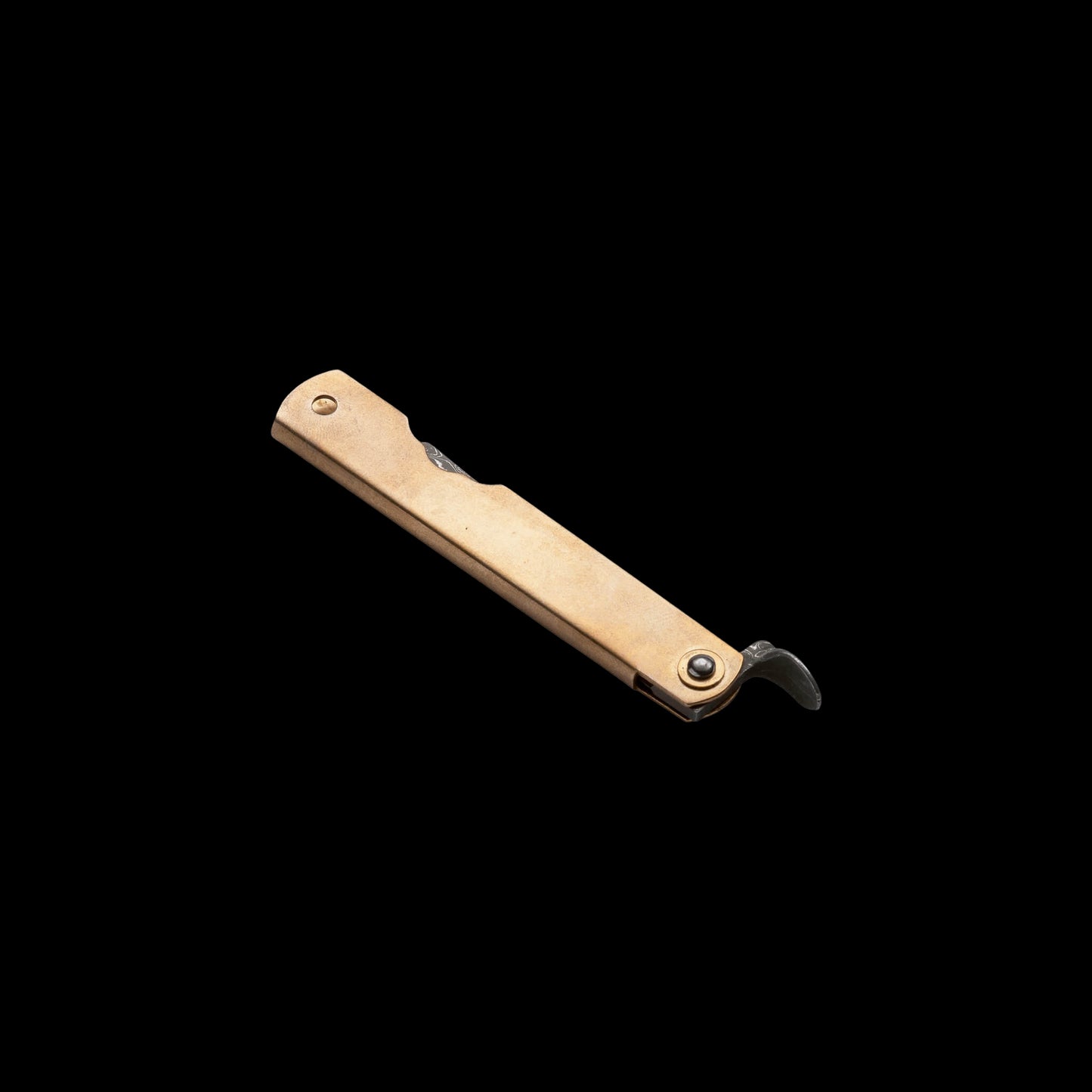 Higo Hoseki Damascus pocket knife with Damascus steel blade, brass handle, and traditional friction folder opening