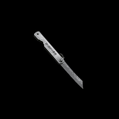 Higo Kinzoku Damascus pocket knife with Damascus steel blade, stainless steel handle, and traditional friction folder opening
