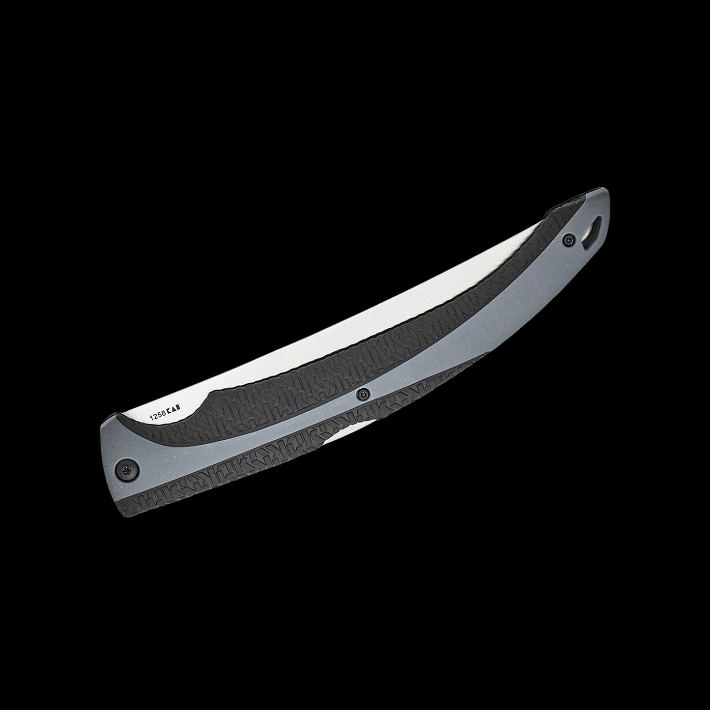 A folding pocket knife with a satin-finished silver blade and a textured black handle, shown diagonally against a solid black background.