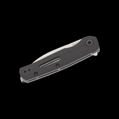 A folding pocket knife with a black textured handle and a silver metal blade, shown open against a solid black background.