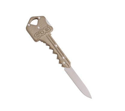 A tactical folding pocket knife shaped like a key, featuring a tan textured key head with the 'SOC' logo and a silver stainless steel blade, shown on a plain white background.