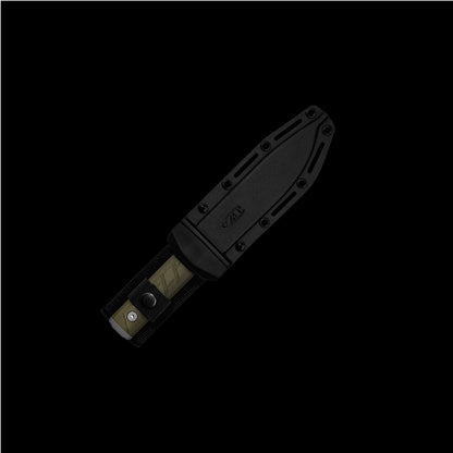 A black tactical sheath containing a knife, shown diagonally against a solid black background. The sheath features a molded black design with screw holes and a visible 'VAK' brand logo.